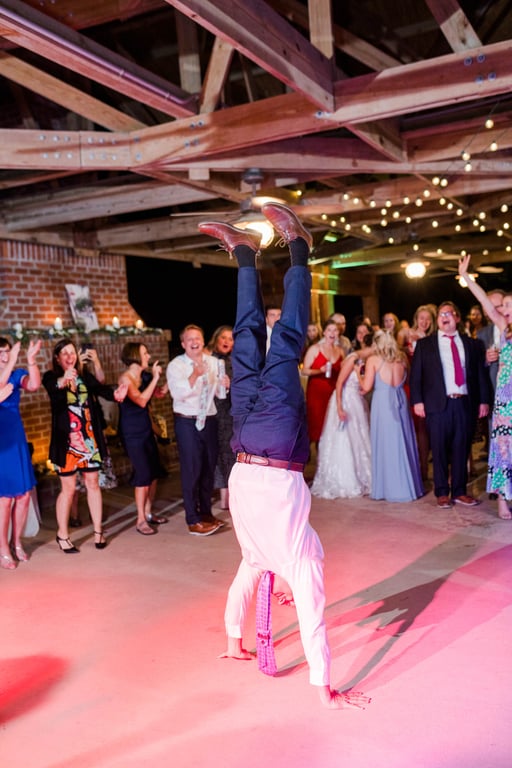 Coastal discovery museum wedding dancing handstand